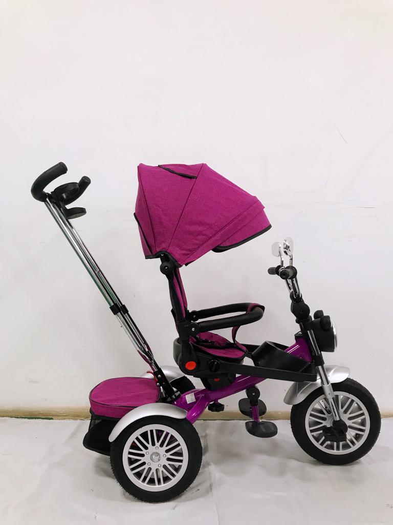 Tricicleta evolutiva, roti cauciuc, cu pozitie de somn, scaun rotativ si muzica distractiva, culoare MOV, BBD5199M