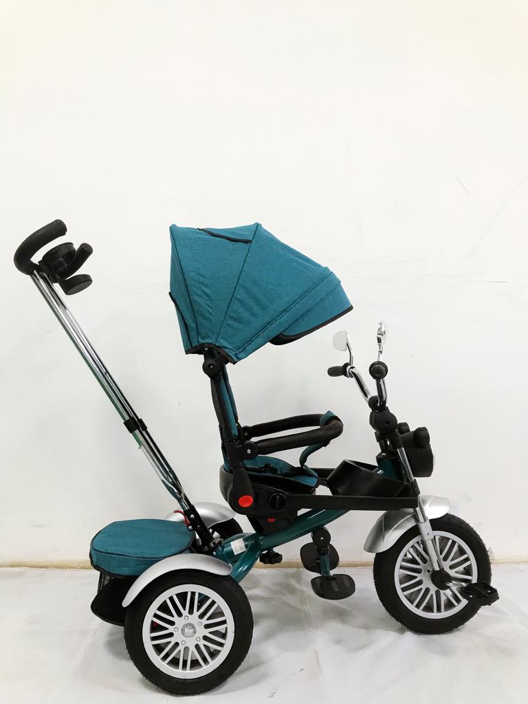 Tricicleta L-Sun SL03, cu pozitie de somn, scaun rotativ si muzica distractiva,roti cauciuc, culoare TURCOAZ,