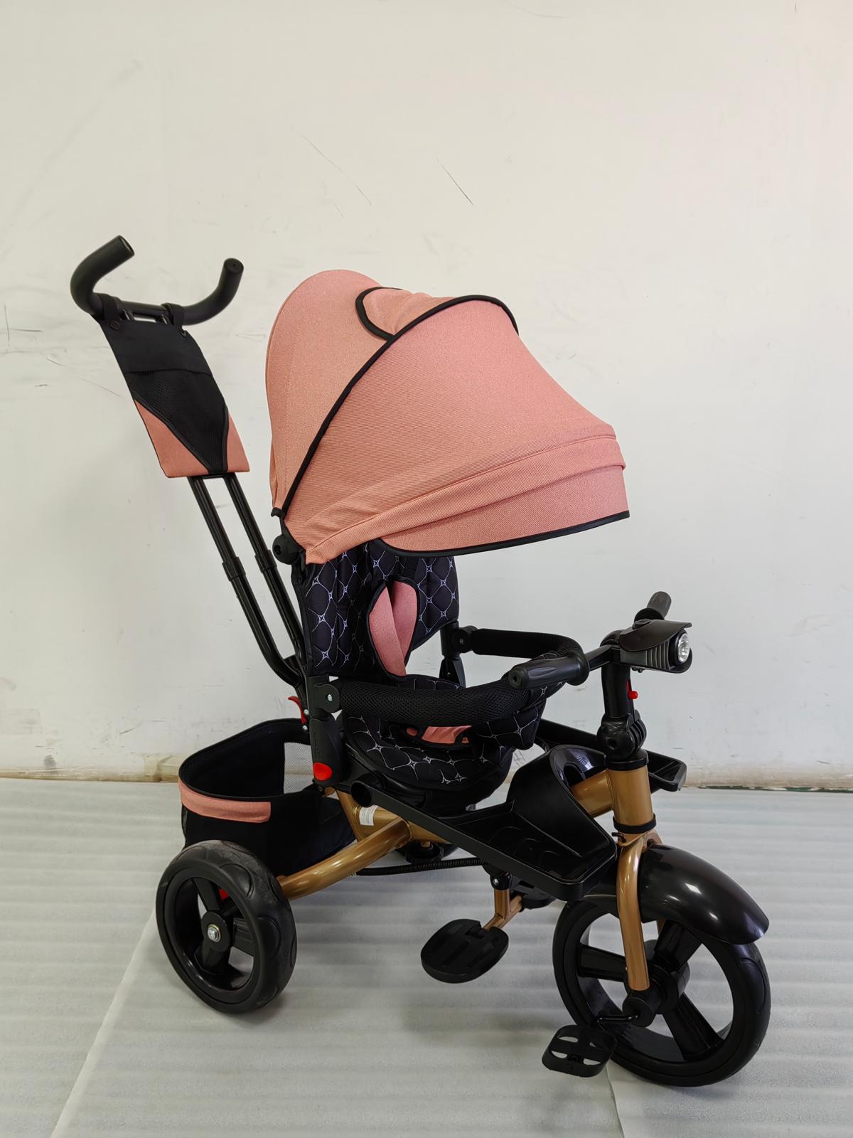 Tricicleta cu pozitie de somn, scaun rotativ si muzica distractiva, Roz Somon