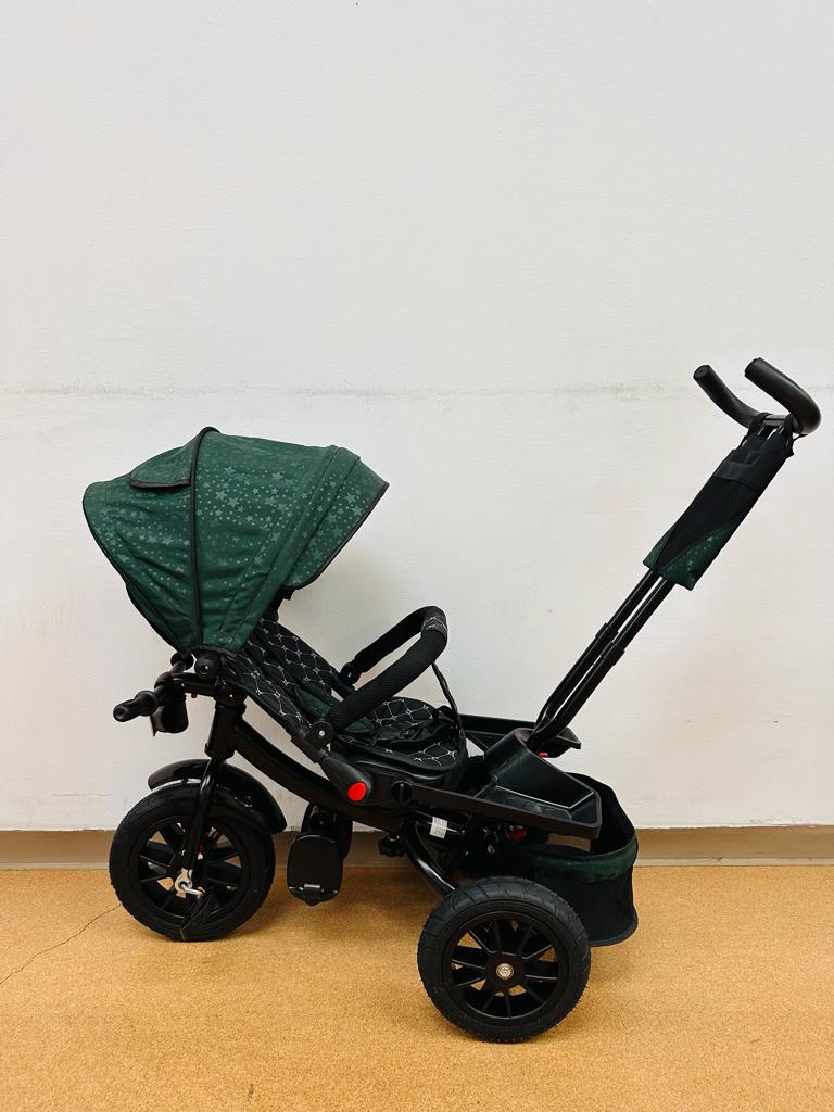 Tricicleta roti cauciuc plin, cu pozitie somn, scaun rotativ, muzica si lumini,culoare VERDE CADRUL AURIU