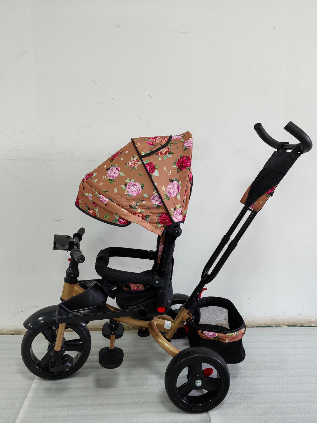 Tricicleta cu pozitie de somn, scaun rotativ si muzica distractiva, Flori