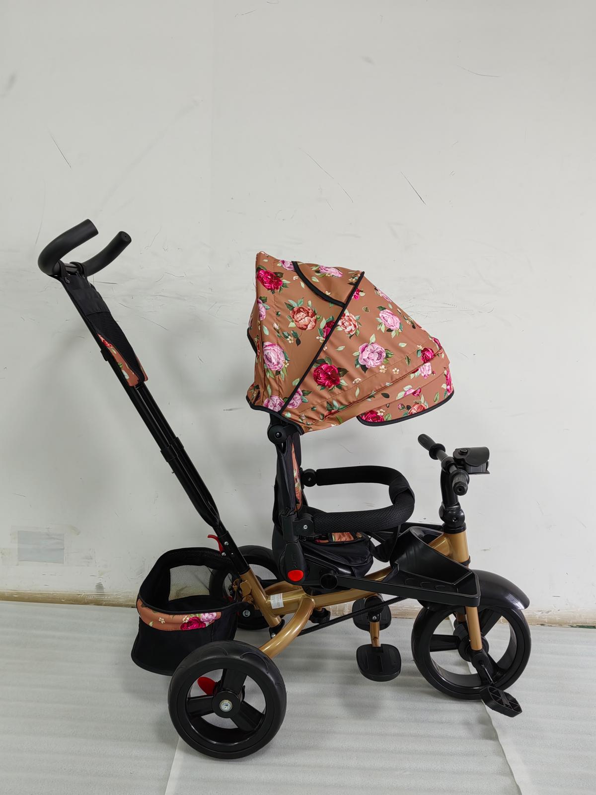 Tricicleta cu pozitie de somn, scaun rotativ si muzica distractiva, Flori