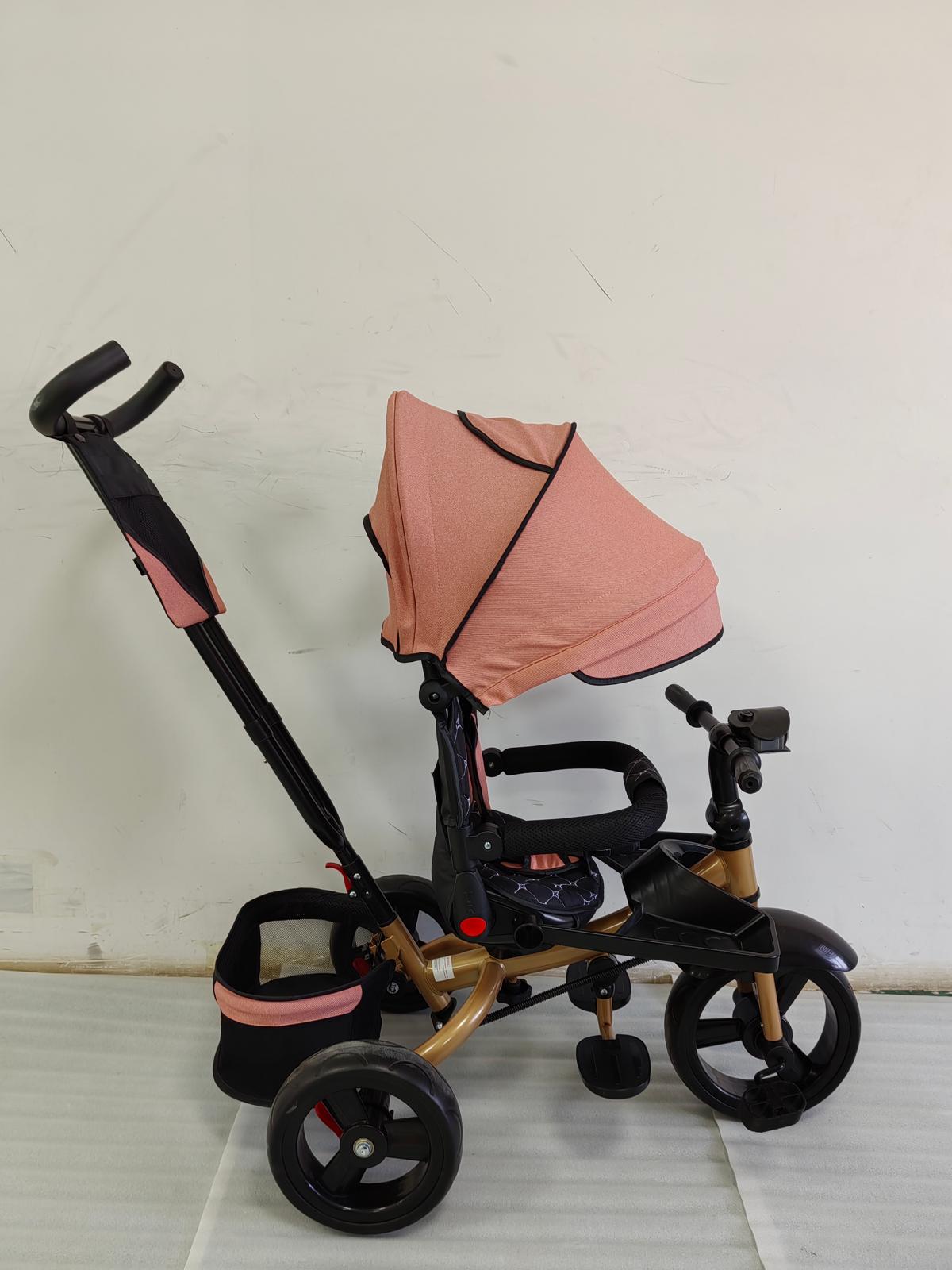 Tricicleta cu pozitie de somn, scaun rotativ si muzica distractiva, Roz Somon
