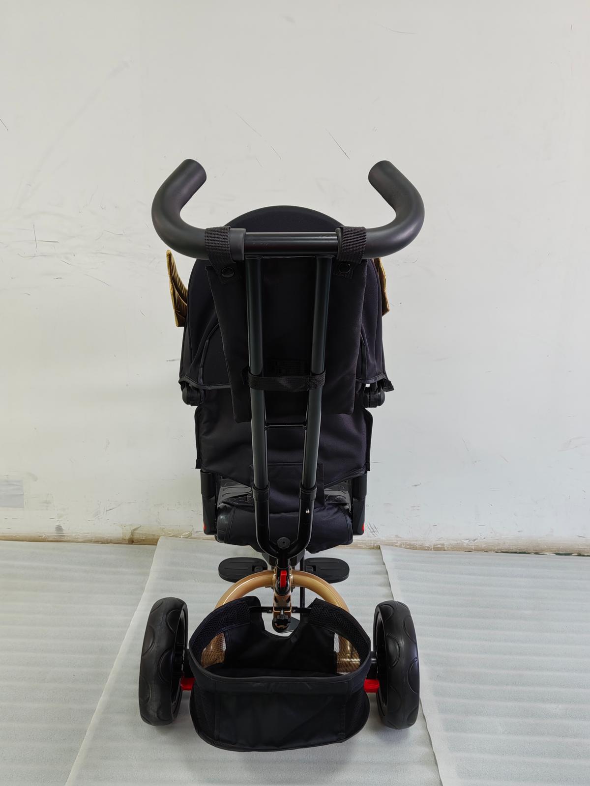 Tricicleta cu pozitie de somn, scaun rotativ si muzica distractiva, Negru