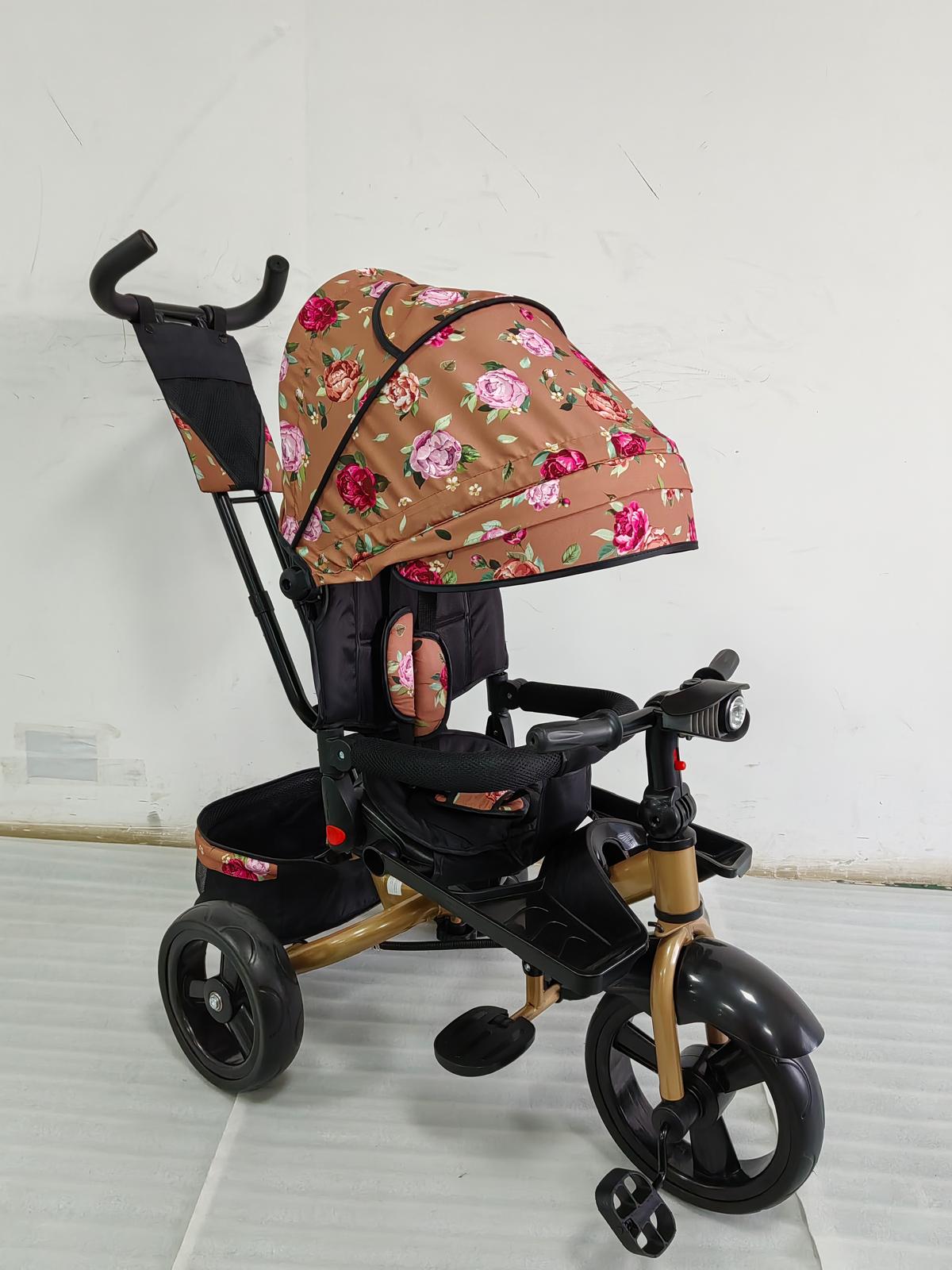 Tricicleta cu pozitie de somn, scaun rotativ si muzica distractiva, Flori