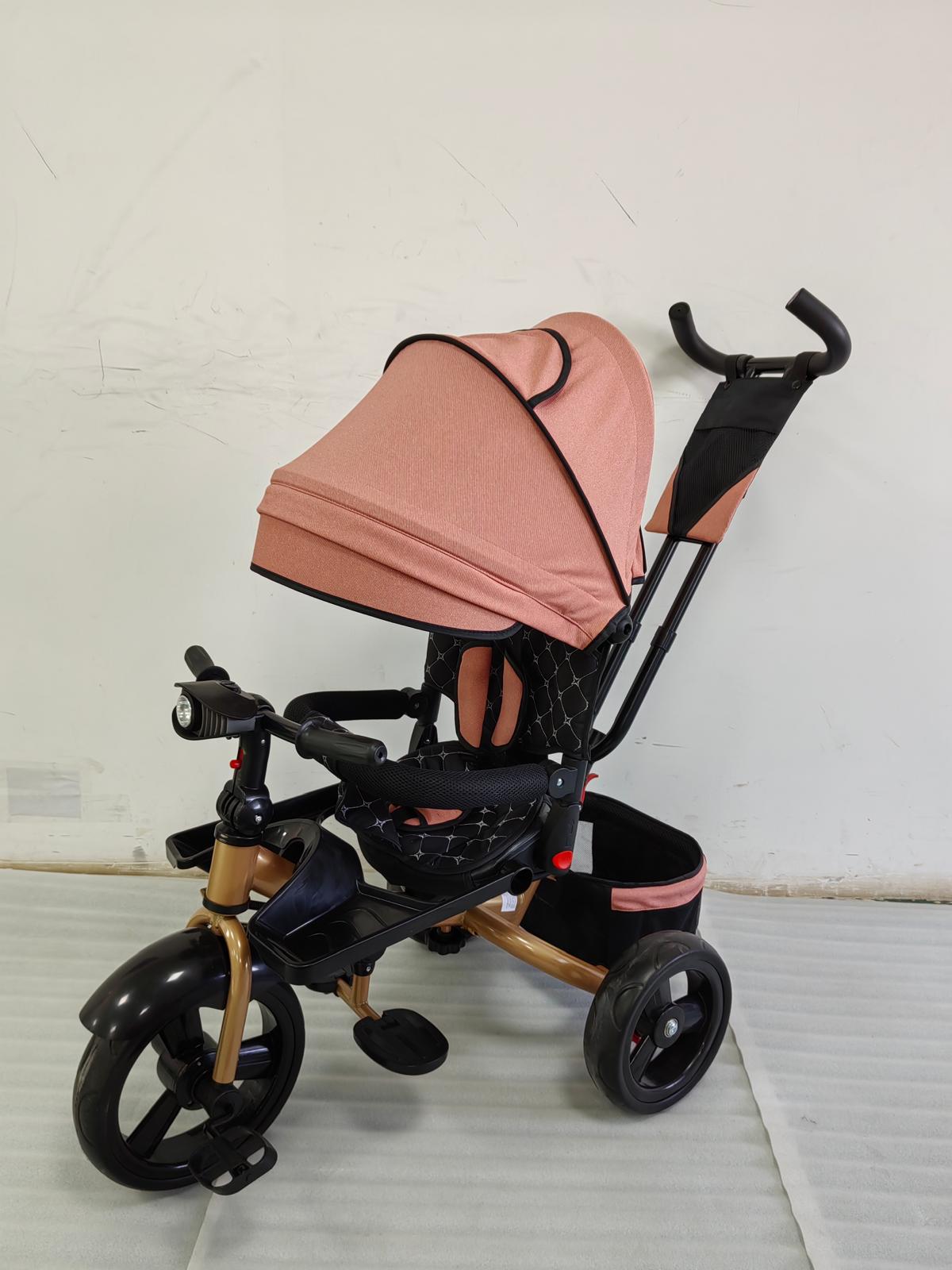 Tricicleta cu pozitie de somn, scaun rotativ si muzica distractiva, Roz Somon