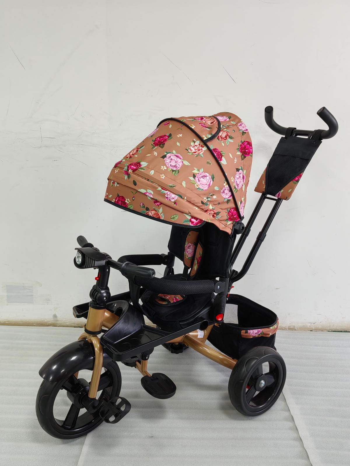 Tricicleta cu pozitie de somn, scaun rotativ si muzica distractiva, Flori