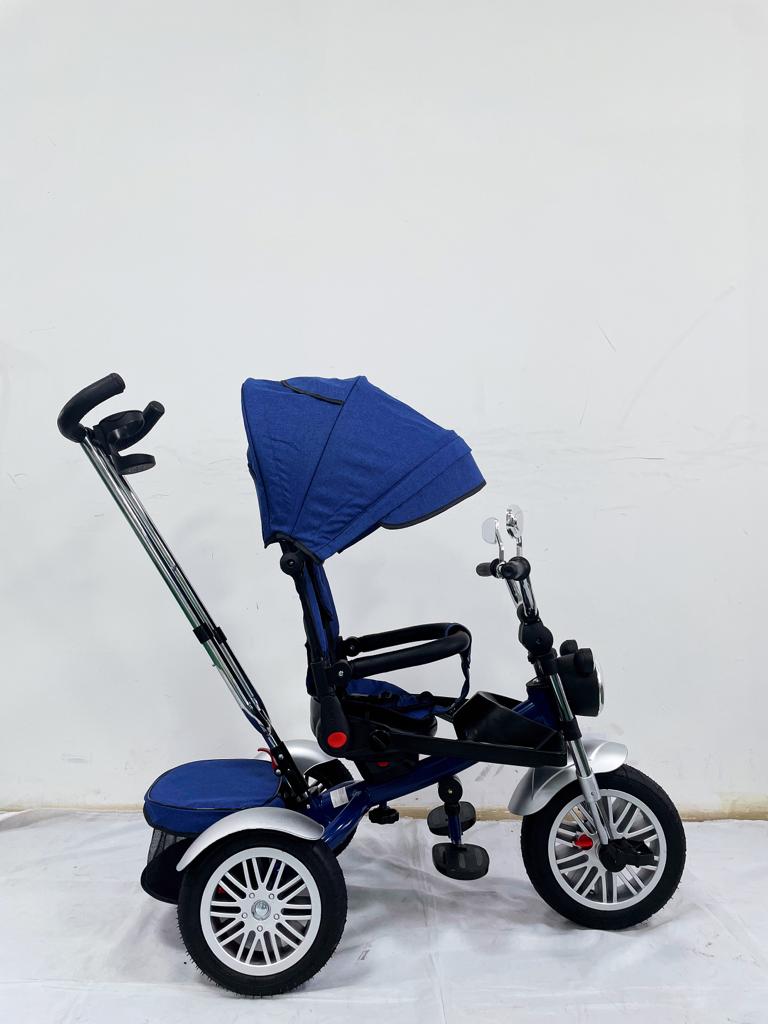 Tricicleta  evolutiva, roti cauciuc, cu pozitie de somn, scaun rotativ si muzica distractiva, culoare ALBASTRU BBD5199A