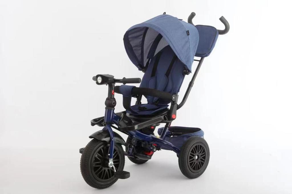 Tricicleta cu roti cauciuc,  pozitie de somn, scaun rotativ si muzica distractiva, albastra 6088TR ,