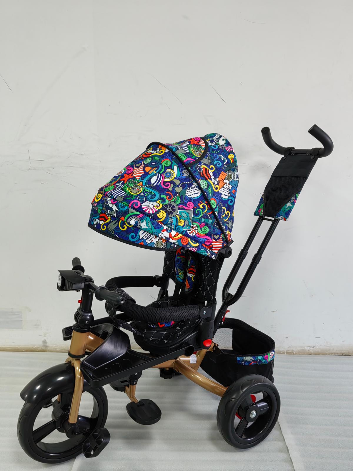 Tricicleta cu pozitie de somn, scaun rotativ si muzica distractiva, Multicolor